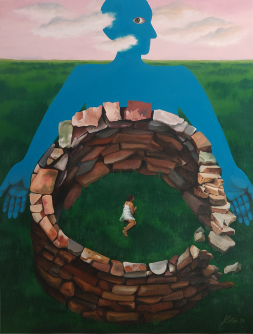 person laying on grass inside of large stone well